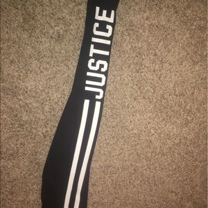 Black leggings with white stripes